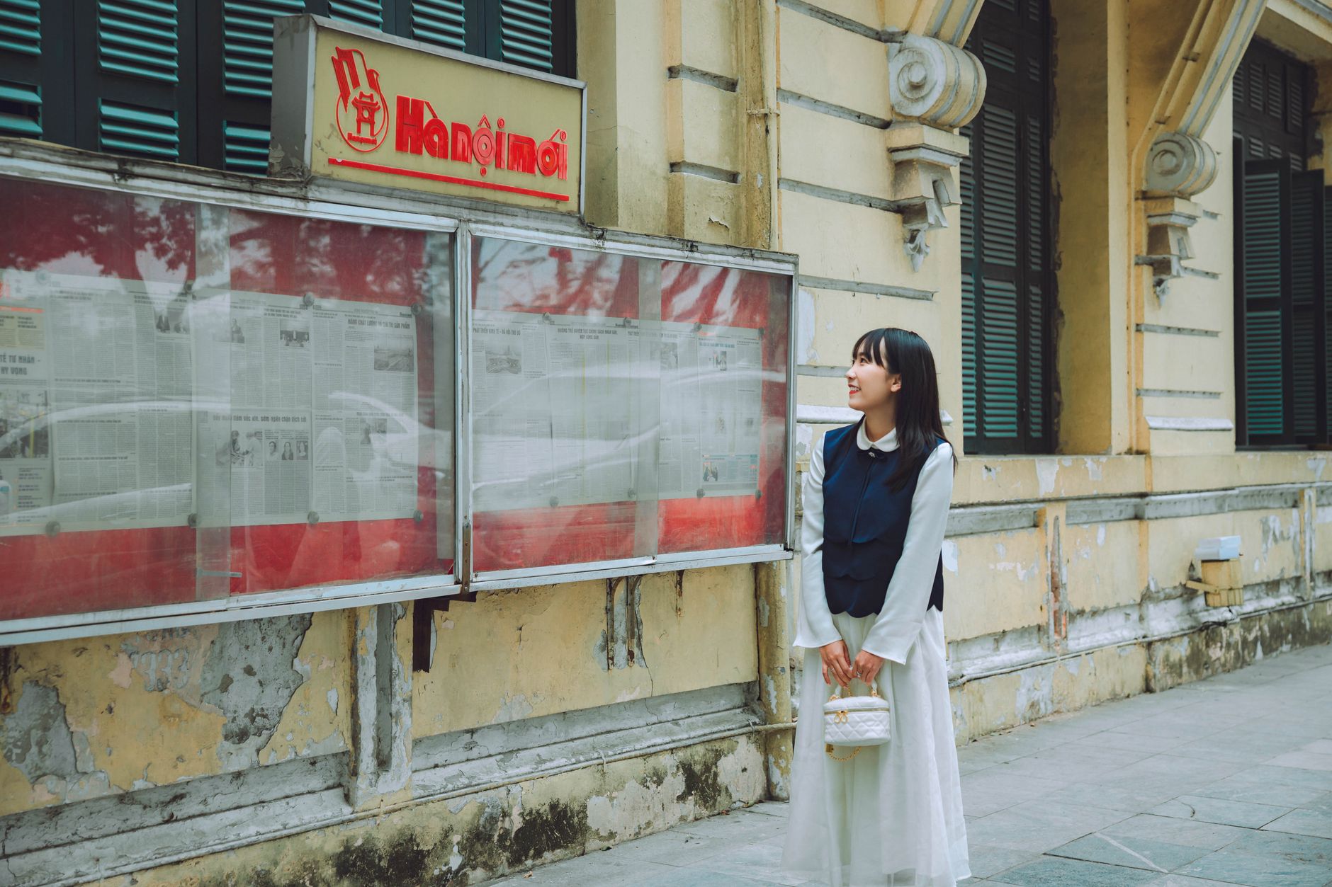 young traveler light cardigan hanoi street